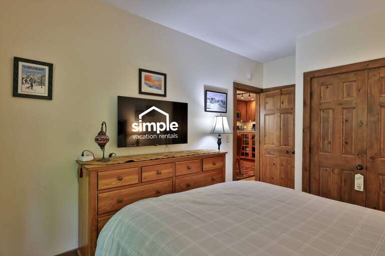 Unpack into two closets, then wind down with a show from bed.