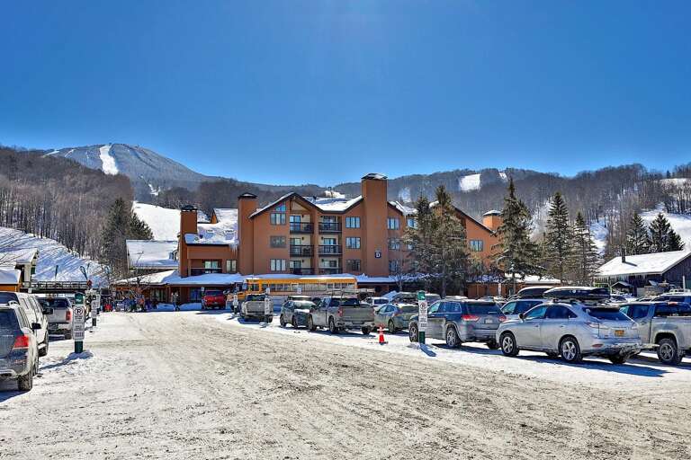 The snowy lot sits between the lodge and Pico's lower trails.