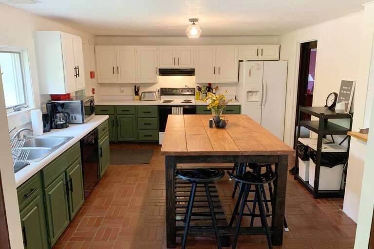 Cook breakfast at home, with five seats at the island and a dishwasher for the cleanup.