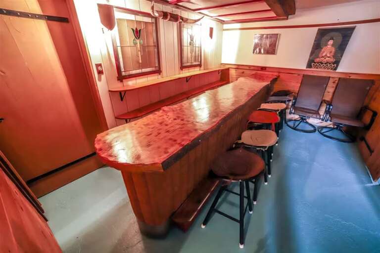 Take your drinks downstairs and spend the evening at the long basement bar.