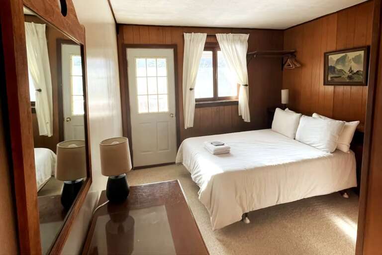 Bedroom 7 has a full bed and a private full bathroom for guests who want their own space.