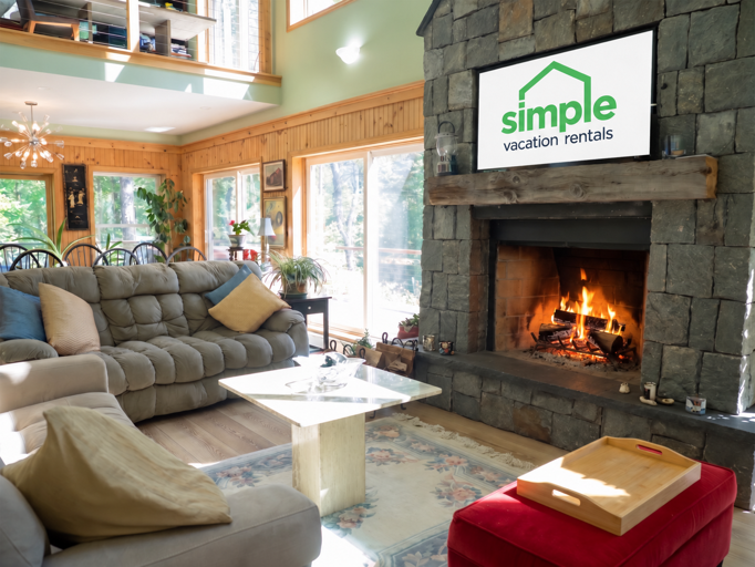 Choose a sofa near the hearth for conversation or a movie on the TV above it.