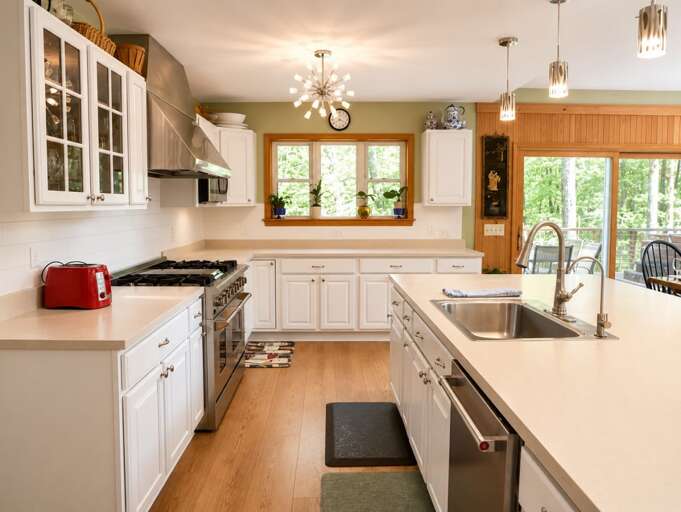 A wide gas range and a separate island prep area give you space to put a full dinner together.
