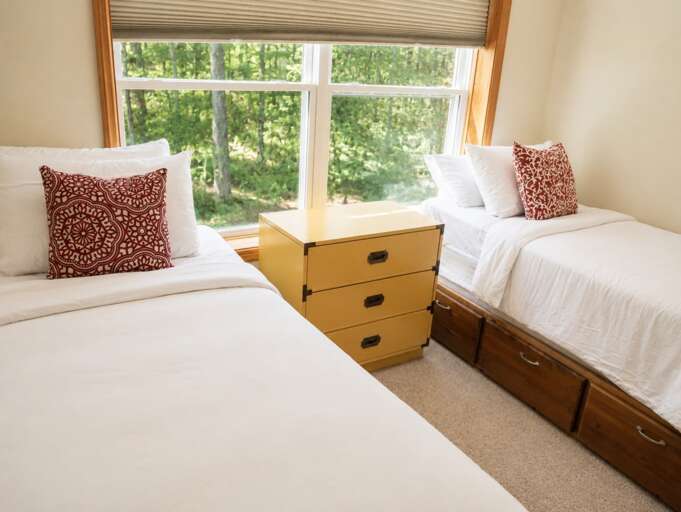 Two twins share this bedroom, a useful option for friends who want their own sleeping space.