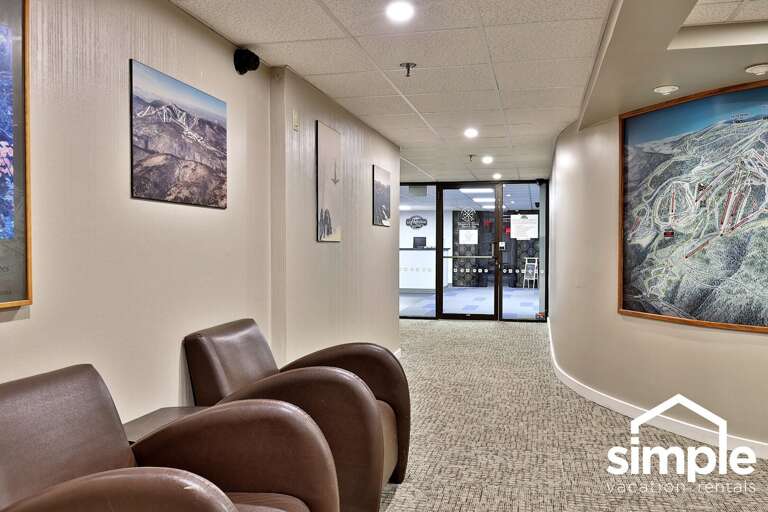 Armchairs in the shared corridor give you somewhere to wait for the rest of your group.
