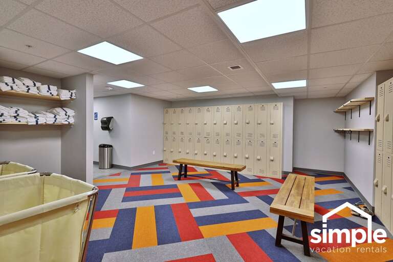 Benches, lockers and towel shelves serve the resort's shared recreation area.