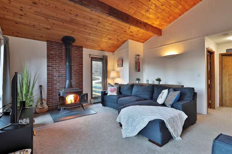 The sectional faces the wood-burning stove for evenings back at the house.