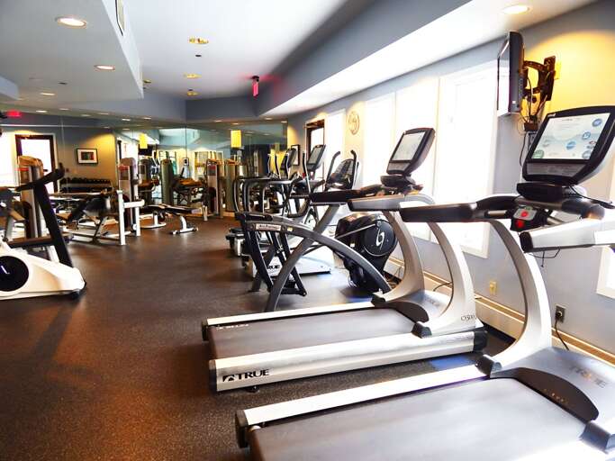 The Sunrise fitness center has cardio machines alongside strength equipment for a workout when the facility is open.