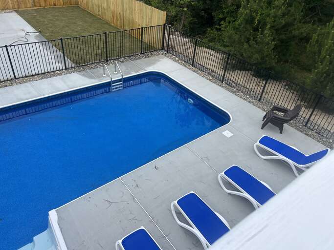 Outdoor Swimming Pool With Lounge Chairs