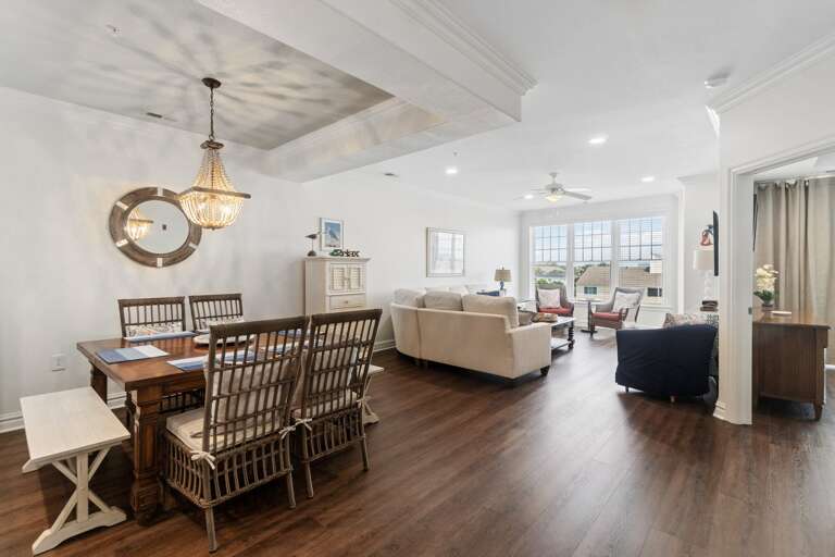 Interior Of A Spacious Living Room With Furniture And Hardwood Floors Interior Of A Spacious Living Room With Furniture And Hardwood Floors
