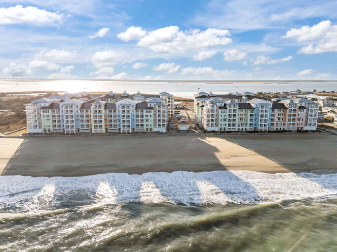 Welcome to The Sanctuary! Enjoy this stunning private Penthouse with views of the Ocean Front and Bay, whether you're inside or out, enjoying the two spacious wrap-around decks, you'll never miss a sunrise or sunset. 