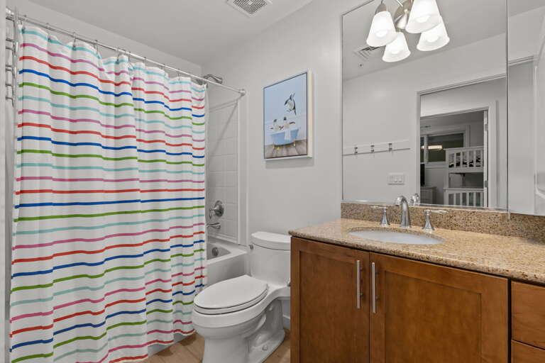 1st Floor 
Hallway - Full bath across from the 2 twin bunks bedroom #3