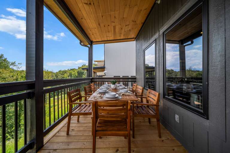 Dine outdoors with a mountain breeze — BBQ grill and seating included