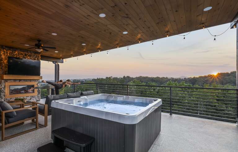 Private rooftop terrace with hot tub, fireplace, and breathtaking sunrise + mountain views. Private rooftop terrace with hot tub, fireplace, and breathtaking sunrise + mountain views.