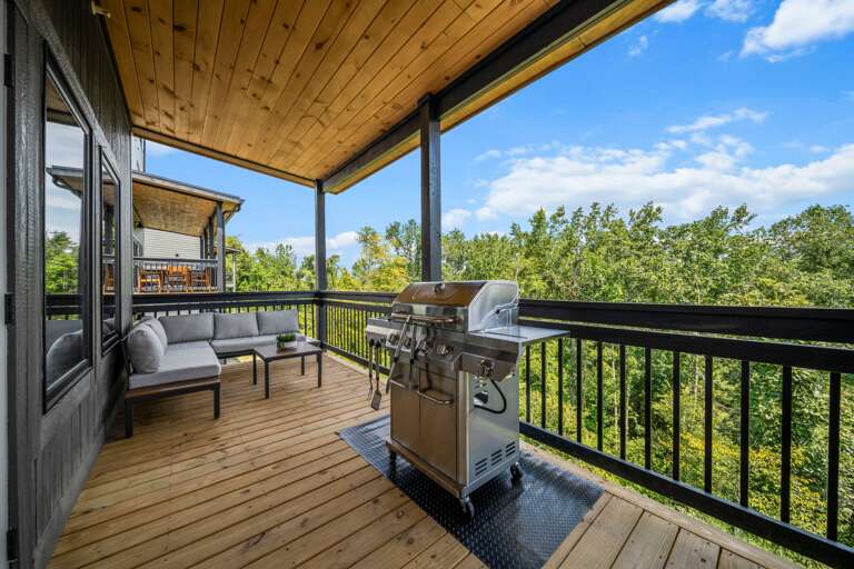 Dine outdoors with a mountain breeze — BBQ grill and seating included