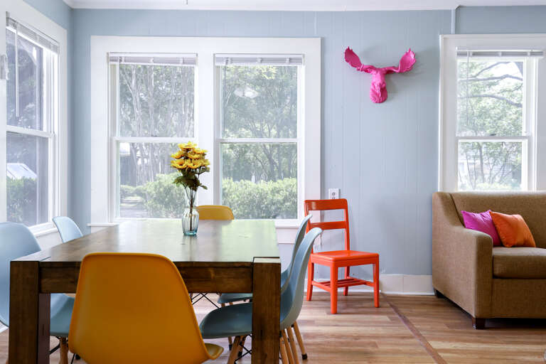 Colorful Chairs In A Contemporary Dining Room