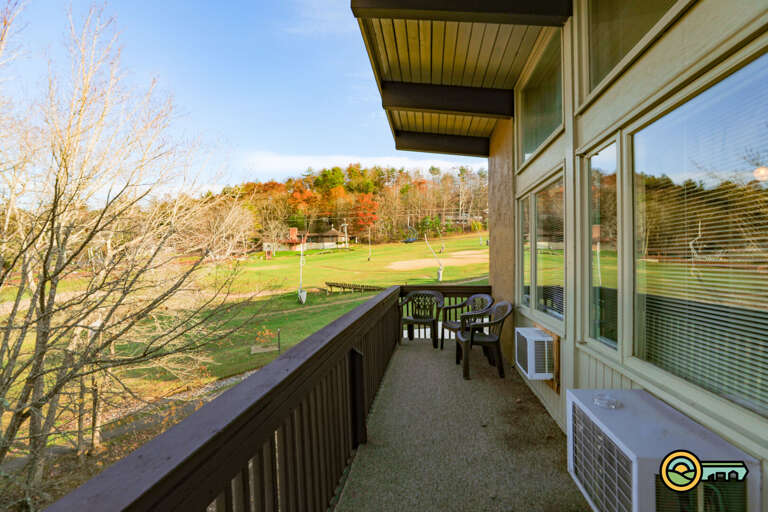 Balcony w/ ski slope view and pool area