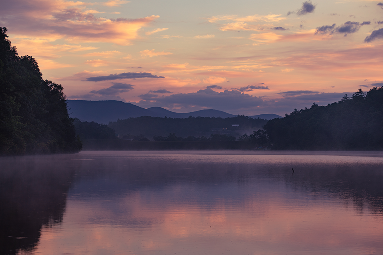 Sunrise Over Calm Lake With Mountains