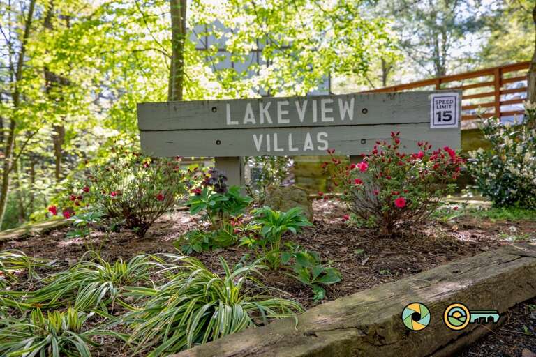 Sign For Lakeview Villas Amidst Greenery