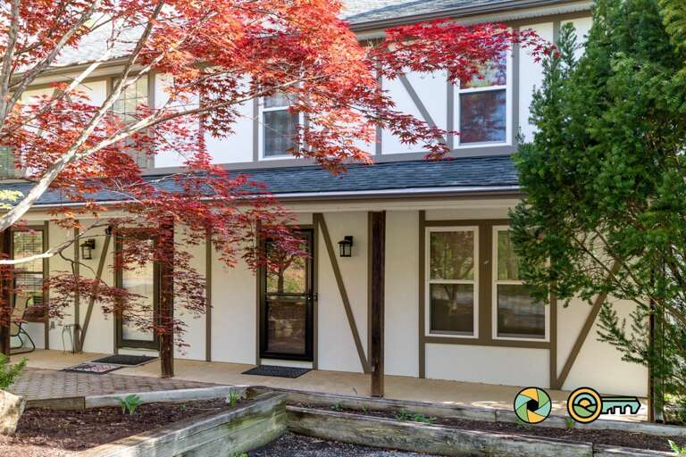 Residential Building Entrance With Red Foliage Residential Building Entrance With Red Foliage