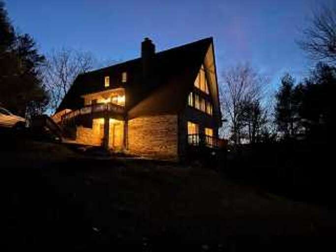 Bluebird Chalet at night