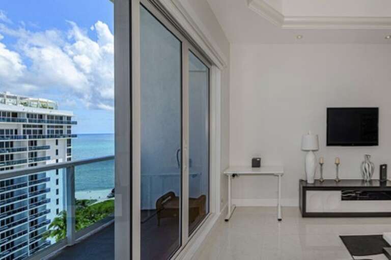 Hotel Room Interior With Balcony View Of The Ocean Hotel Room Interior With Balcony View Of The Ocean