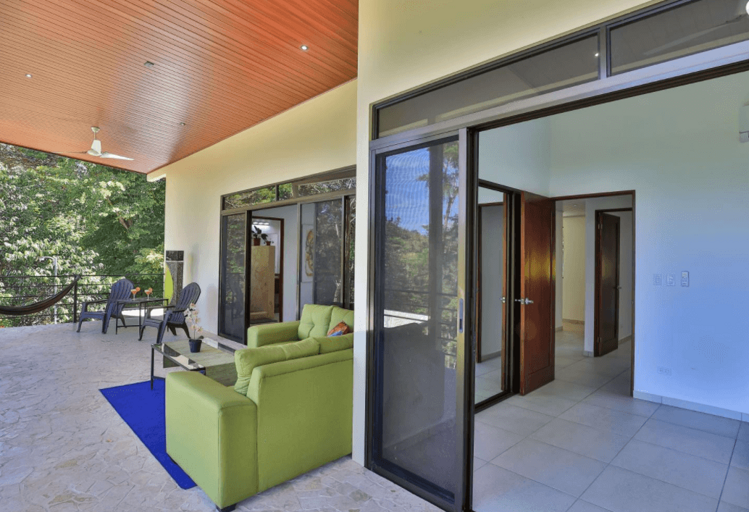 Modern Living Room Opening To A Patio