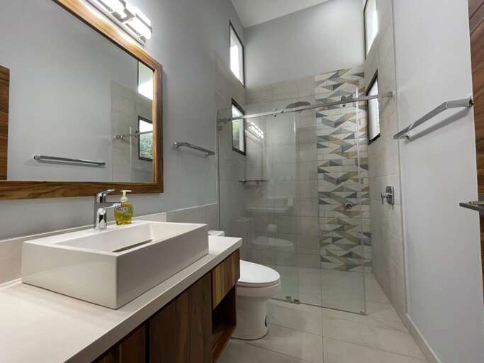 Modern Bathroom With Glass Shower Cabin And Vanity Modern Bathroom With Glass Shower Cabin And Vanity