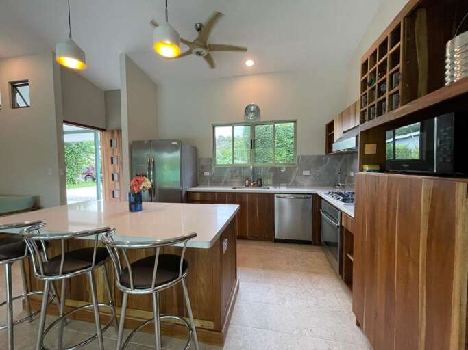 Modern Kitchen Interior With Island And Bar Stools Modern Kitchen Interior With Island And Bar Stools