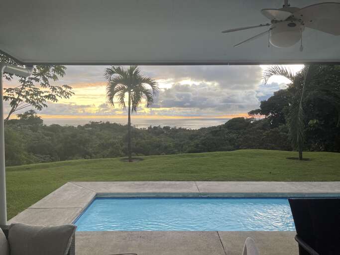 Scenic View With Swimming Pool And Sunset Scenic View With Swimming Pool And Sunset