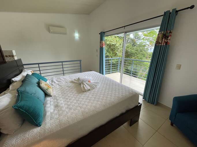 Bedroom Interior With Bed, Curtains, And Chair Bedroom Interior With Bed, Curtains, And Chair