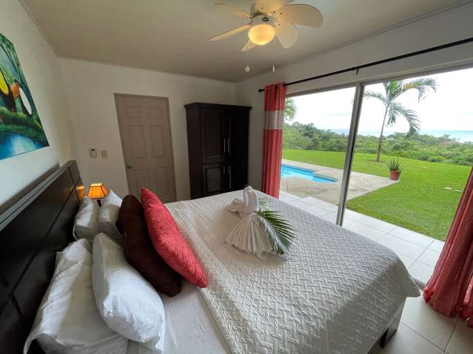 Room Interior With Bed And Pool View Room Interior With Bed And Pool View
