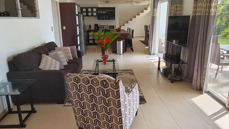 Modern Living Room Interior With Furniture And Staircase Modern Living Room Interior With Furniture And Staircase