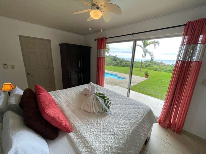 Bedroom Interior With Open View To Pool And Landscape Bedroom Interior With Open View To Pool And Landscape