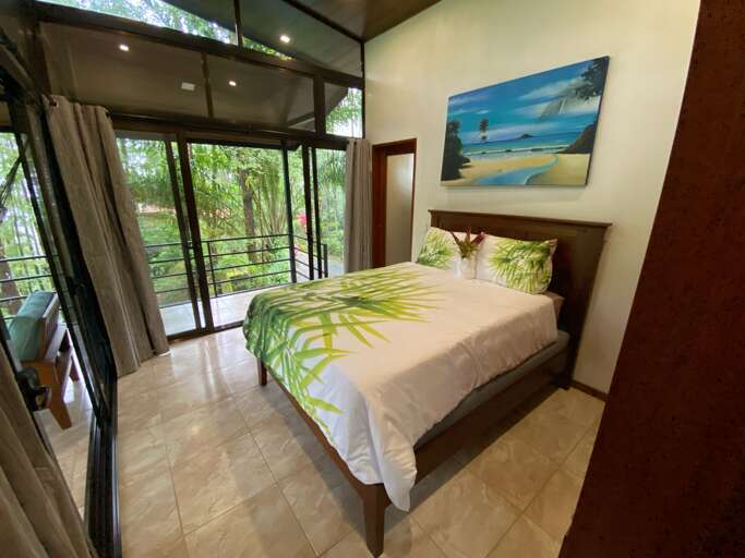Modern Bedroom With Large Windows And Nature View Modern Bedroom With Large Windows And Nature View