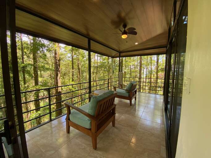 Screened Balcony With Seating Facing Trees Screened Balcony With Seating Facing Trees