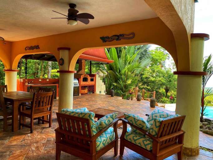 Outdoor Covered Patio With Furniture And Garden View Outdoor Covered Patio With Furniture And Garden View