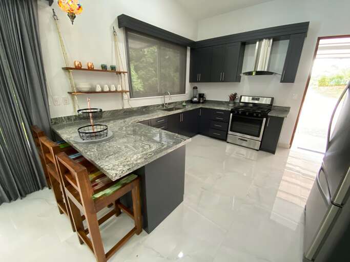 Modern Kitchen With Island And Appliances