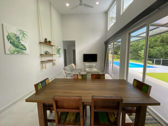 Modern Dining Room Interior With Pool View