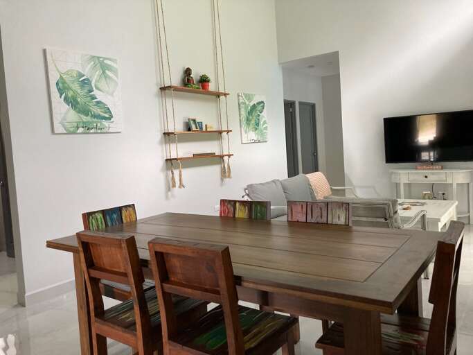 Interior With Dining Table And Living Room Area