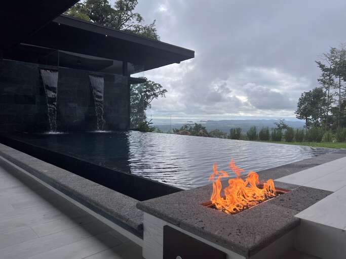 Outdoor Pool With Fire Feature And Scenic View