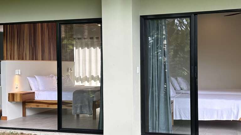 Interior View Of A Modern Room Through Glass Doors Interior View Of A Modern Room Through Glass Doors