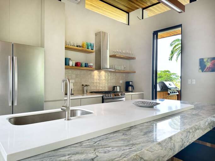 Modern Kitchen Interior With Island And Stainless Steel Appliances Modern Kitchen Interior With Island And Stainless Steel Appliances