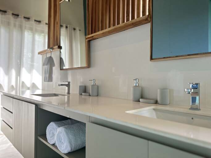 Modern Bathroom Interior With Double Sinks And Mirrors Modern Bathroom Interior With Double Sinks And Mirrors