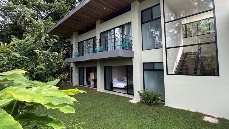 Modern Two-story Building Surrounded By Greenery Modern Two-story Building Surrounded By Greenery