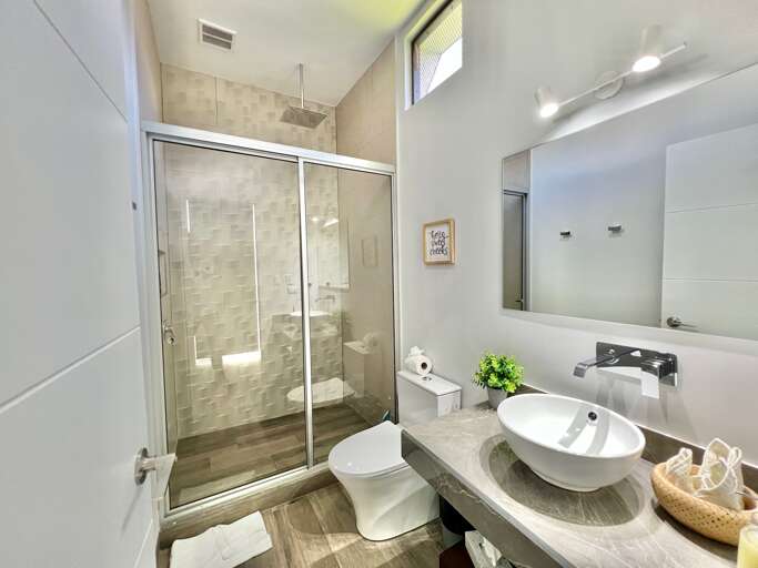 Modern Bathroom Interior With Shower And Mirror