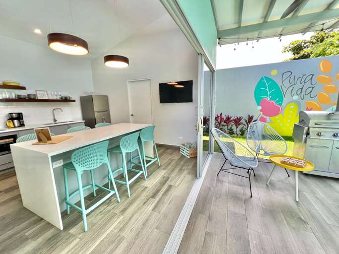 Modern Kitchen And Dining Area With Colorful Decor
