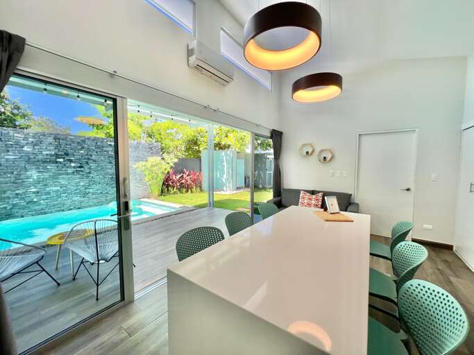 Modern Room Interior With Pool View Through Sliding Glass Doors