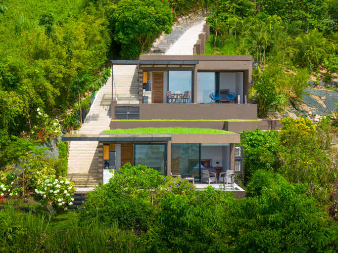 Modern House Surrounded By Greenery