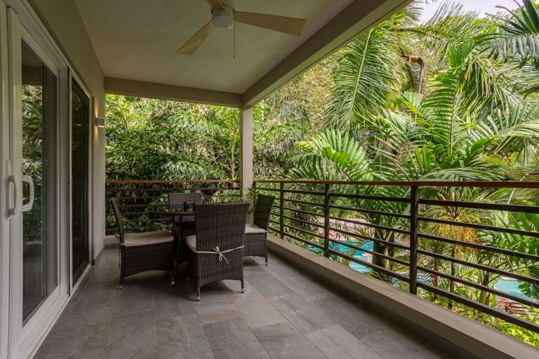 Balcony Bordered By Bamboo, Chairs Facing Flora